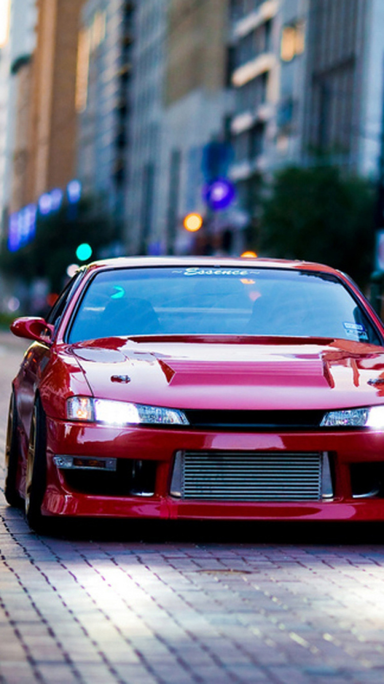 Red Ferrari 458 Italia on Road During Daytime. Wallpaper in 750x1334 Resolution
