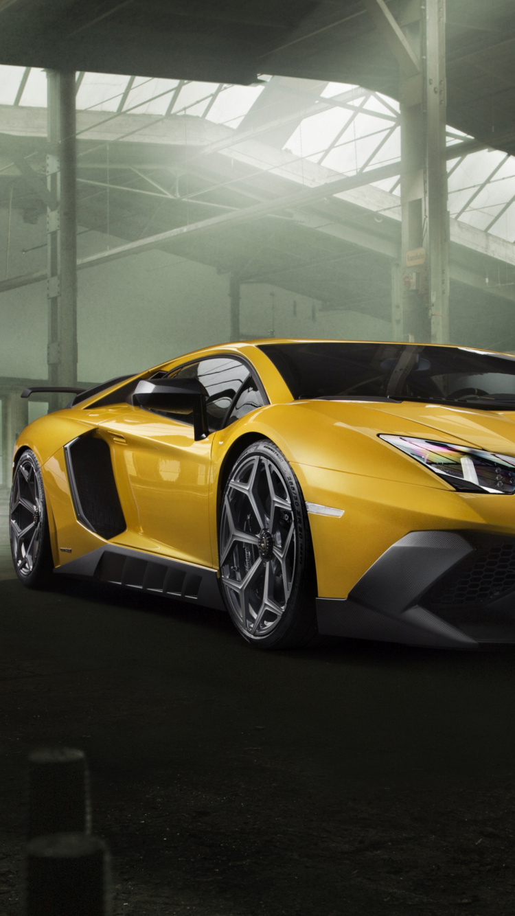 Orange Lamborghini Aventador Parked Inside Building. Wallpaper in 750x1334 Resolution