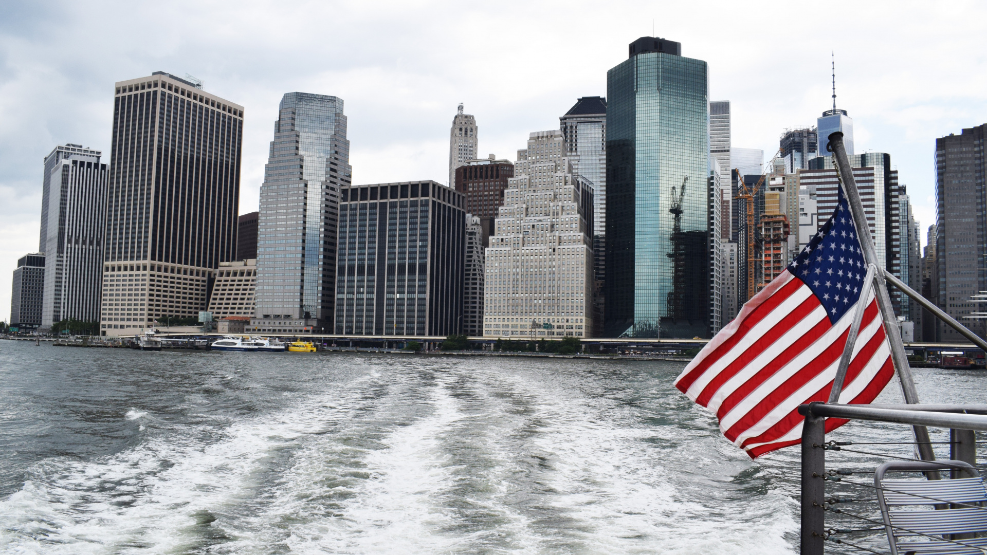 City Skyline Across Body of Water During Daytime. Wallpaper in 1920x1080 Resolution