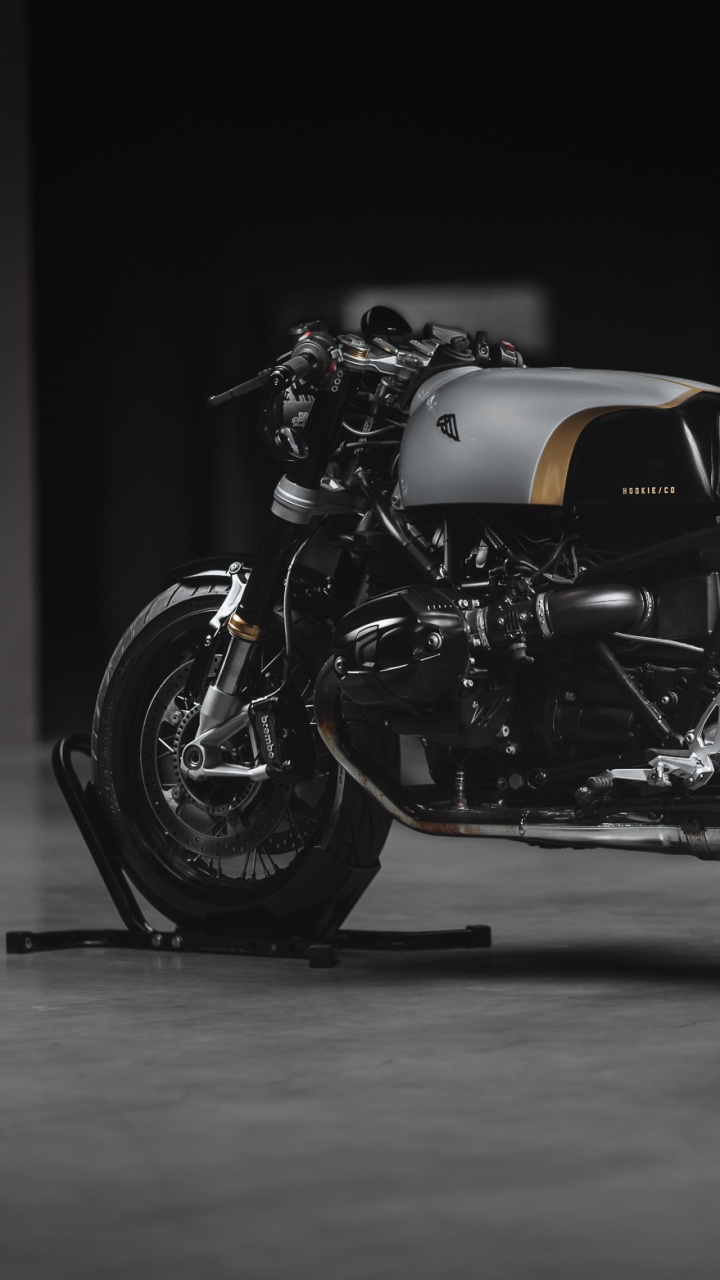 Black and Gray Motorcycle in a Dark Room. Wallpaper in 720x1280 Resolution