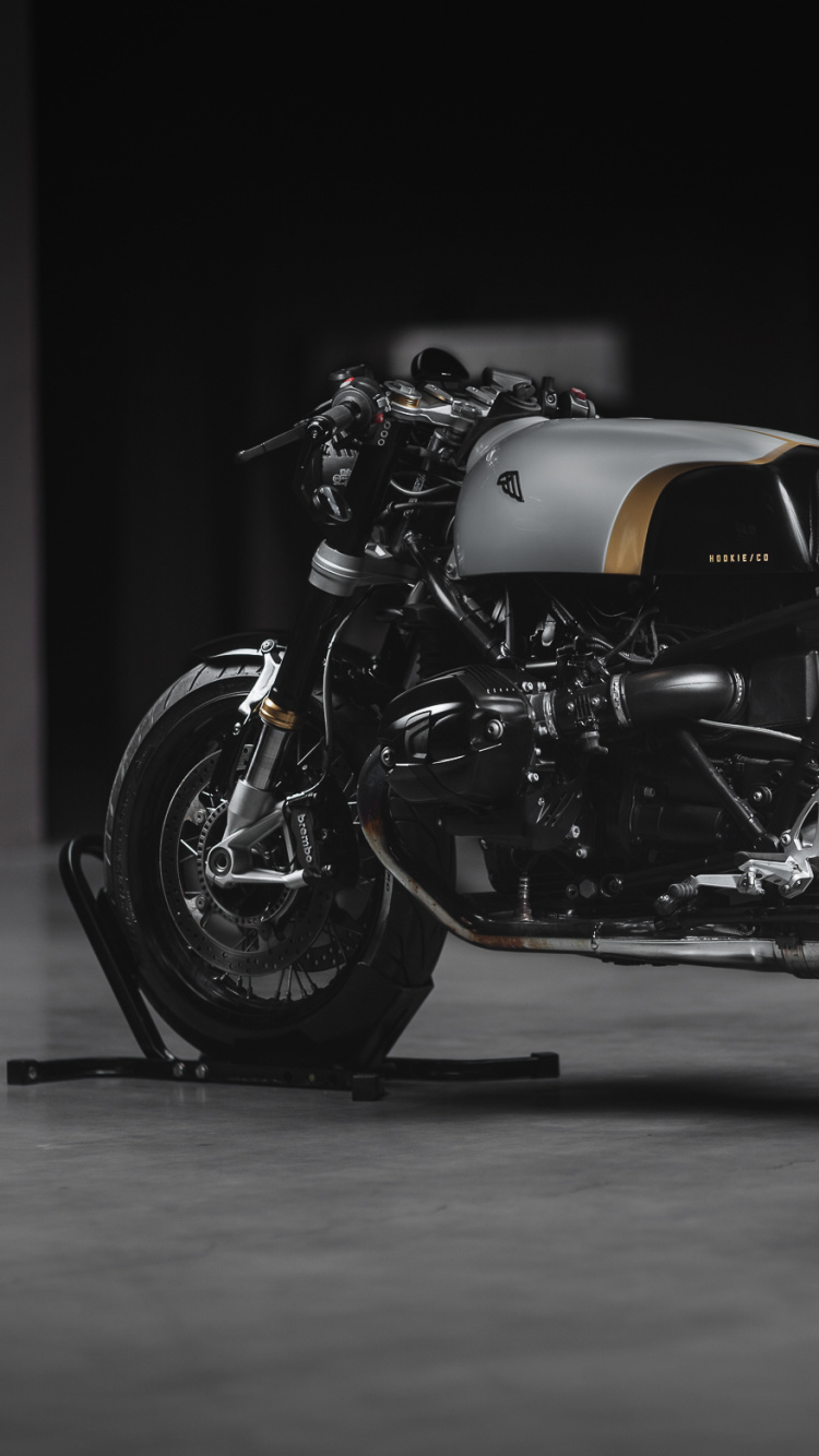 Black and Gray Motorcycle in a Dark Room. Wallpaper in 750x1334 Resolution