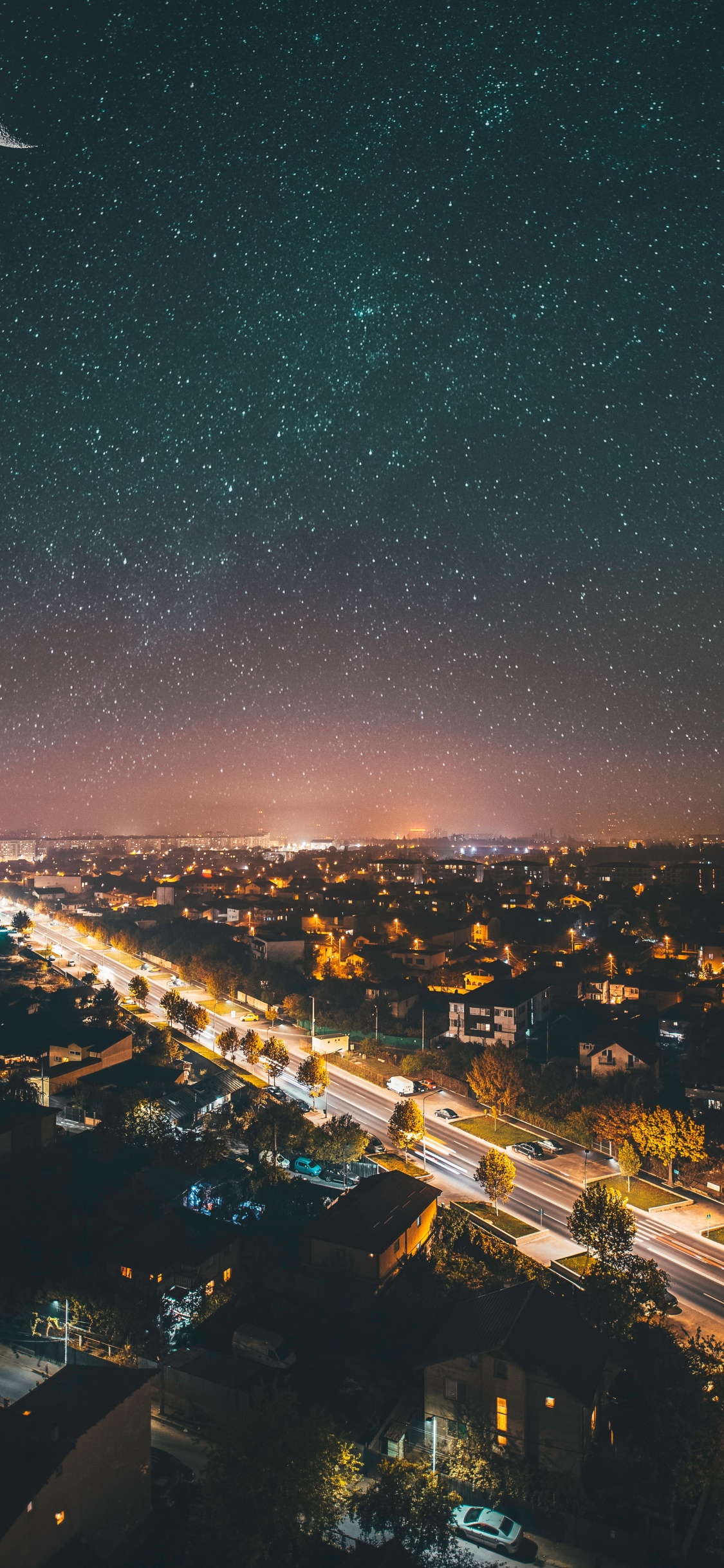 Luces de la Ciudad Durante la Noche. Wallpaper in 1125x2436 Resolution