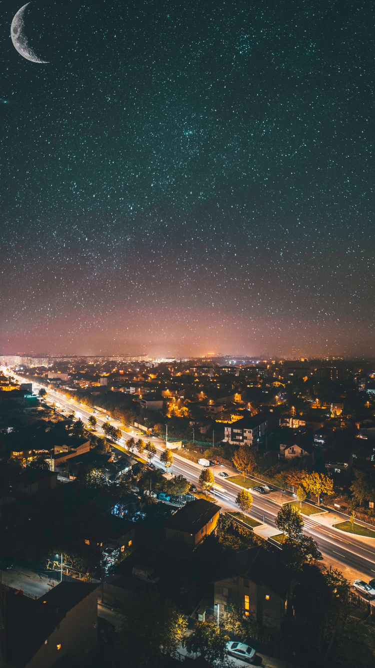 Luces de la Ciudad Durante la Noche. Wallpaper in 750x1334 Resolution