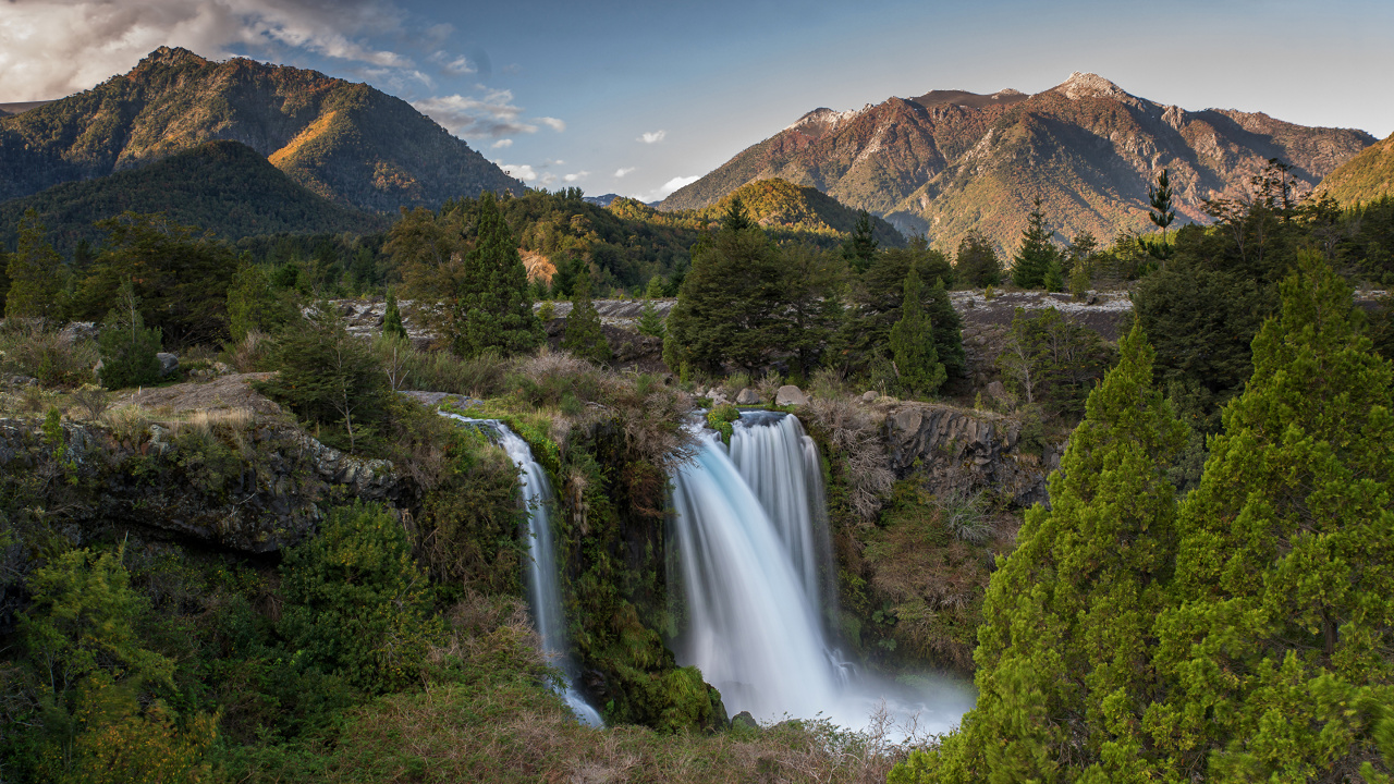Waterfalls in The Middle of Green Trees and Mountains During Daytime. Wallpaper in 1280x720 Resolution