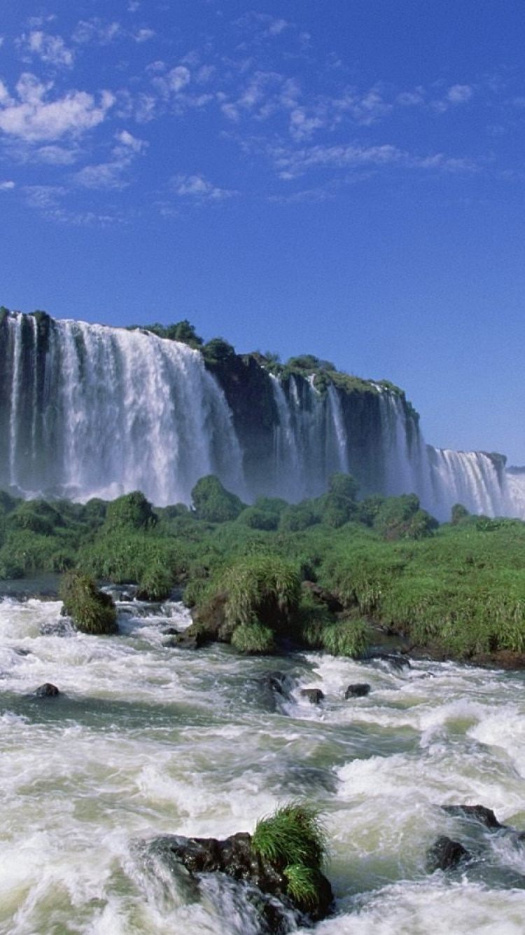 Waterfalls Under Blue Sky During Daytime. Wallpaper in 750x1334 Resolution