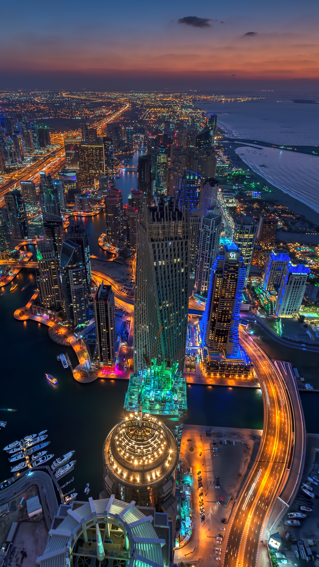 Vista Aérea de la Ciudad Durante la Noche.. Wallpaper in 1080x1920 Resolution