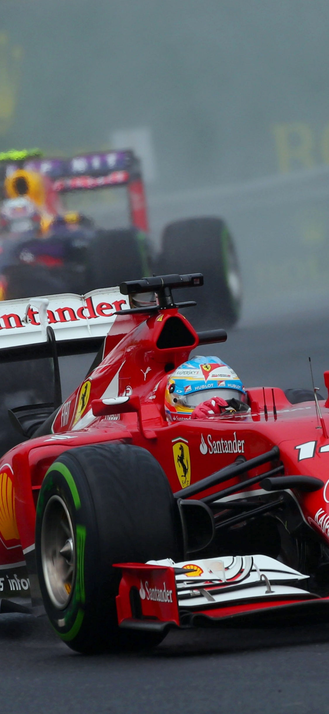 Red and Blue f 1 Race Car on Track. Wallpaper in 1125x2436 Resolution