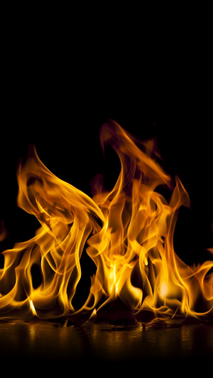 Fire in Black Background With Black Background. Wallpaper in 720x1280 Resolution