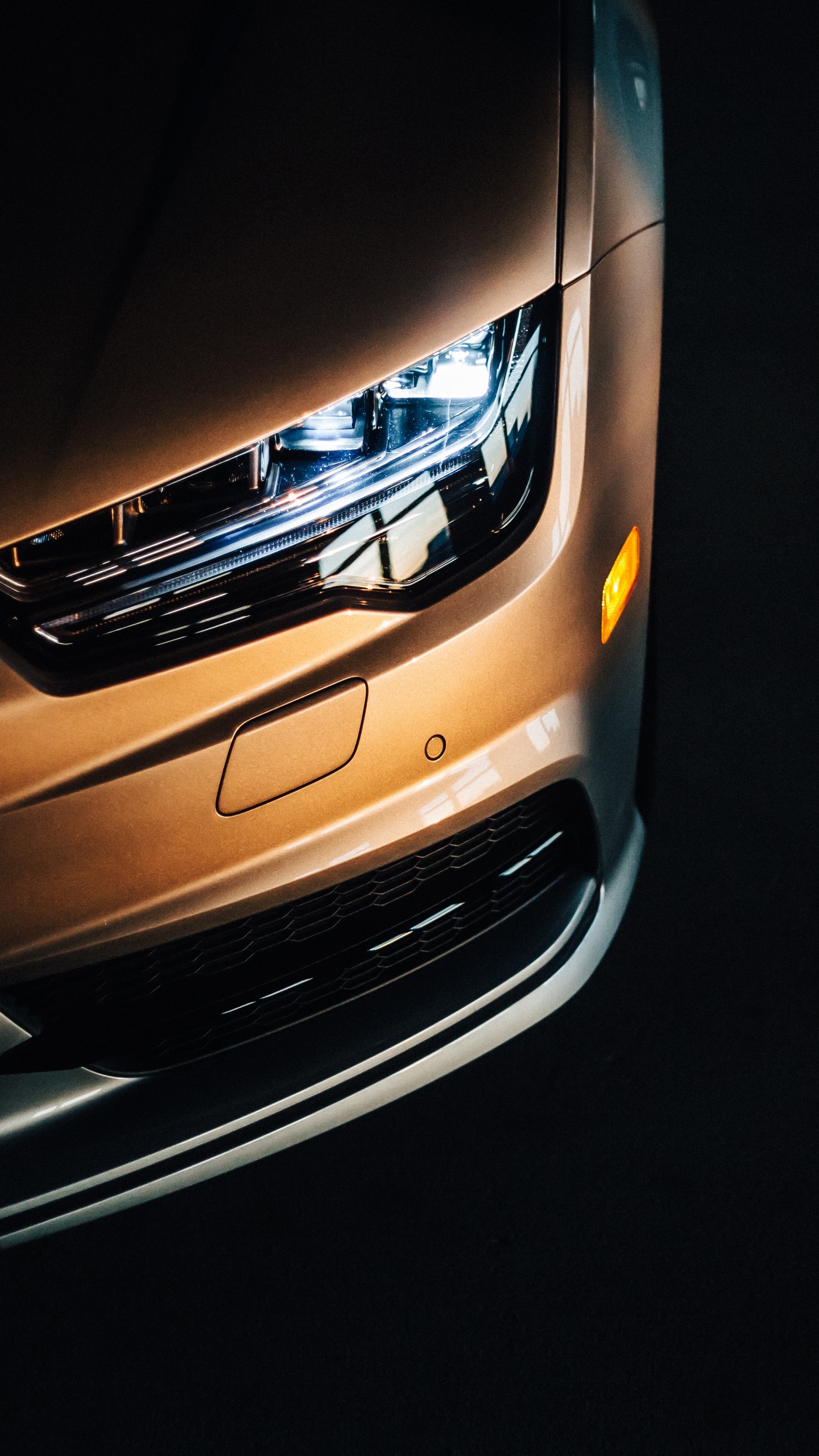 Black Car in a Dark Room. Wallpaper in 1440x2560 Resolution