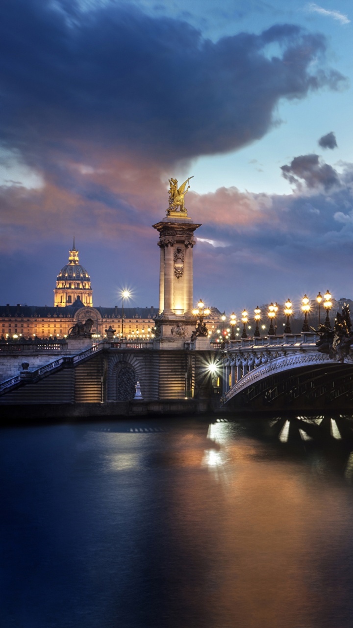 Bridge Over Water During Night Time. Wallpaper in 720x1280 Resolution