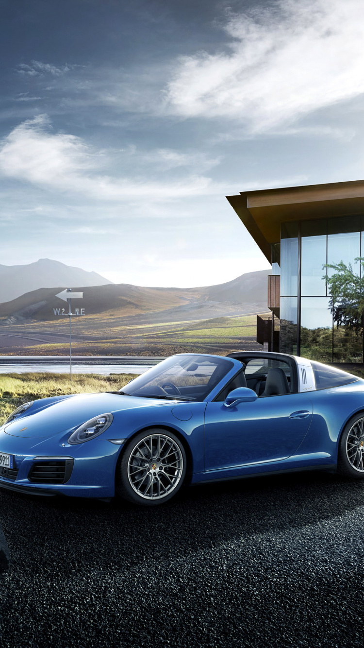 Porsche 911 Bleue Sur un Chemin de Terre Gris Pendant la Journée. Wallpaper in 750x1334 Resolution