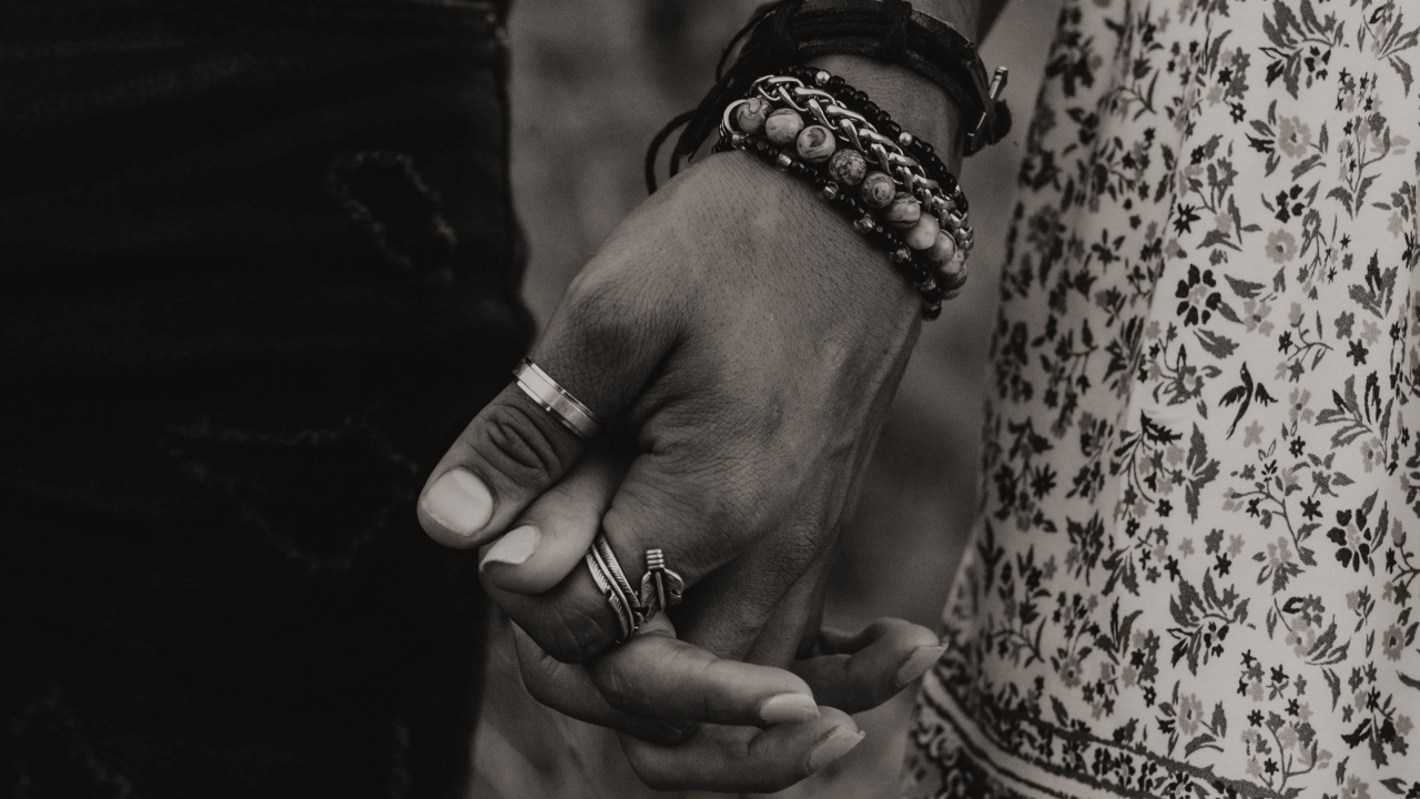 Grayscale Photo of Man and Woman Holding Hands. Wallpaper in 1280x720 Resolution