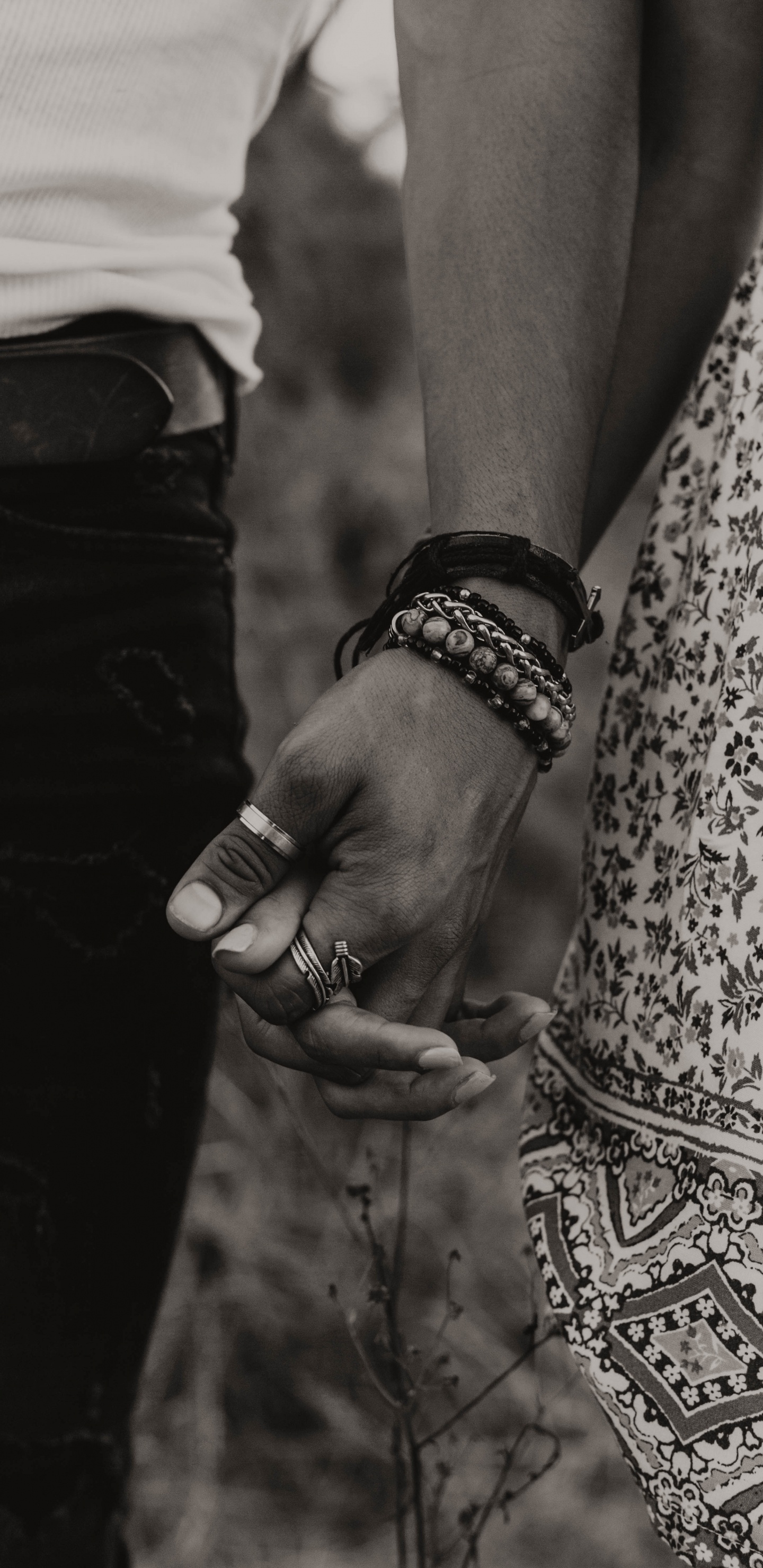 Grayscale Photo of Man and Woman Holding Hands. Wallpaper in 1440x2960 Resolution