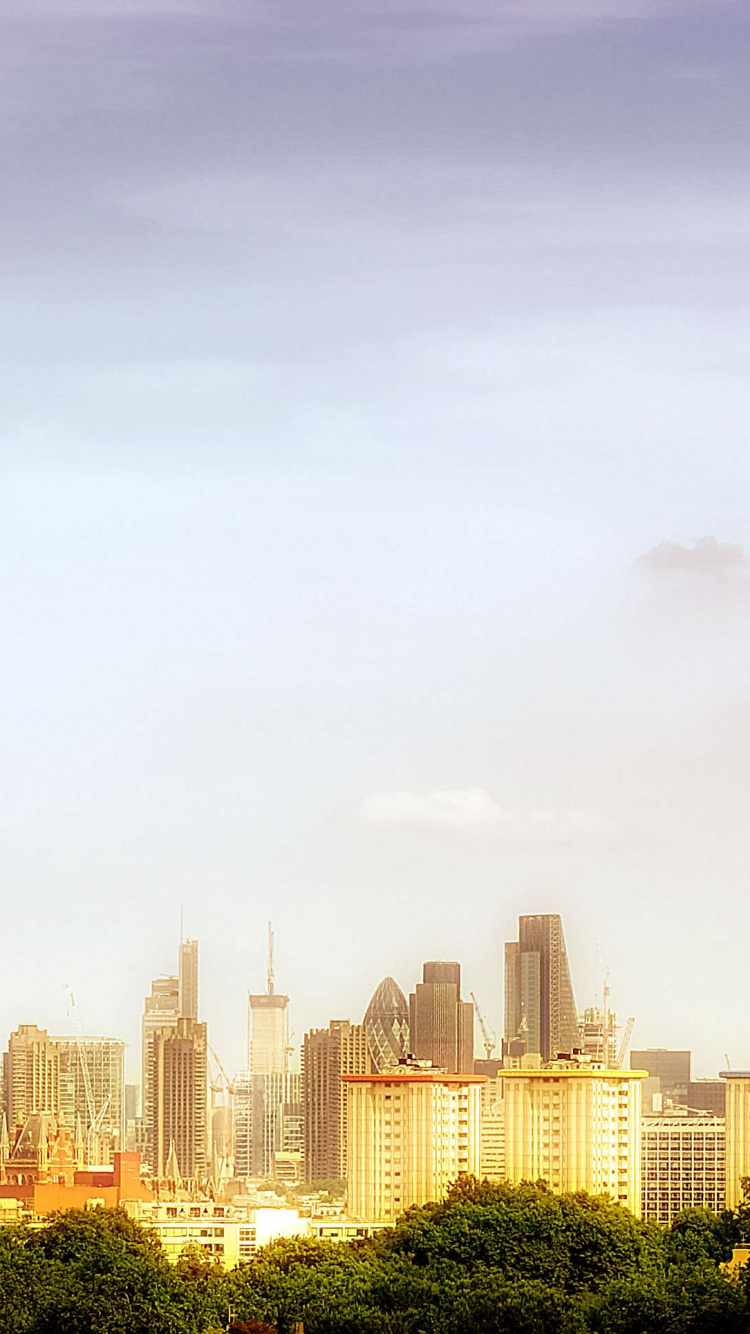 City Buildings Under White Sky During Daytime. Wallpaper in 750x1334 Resolution