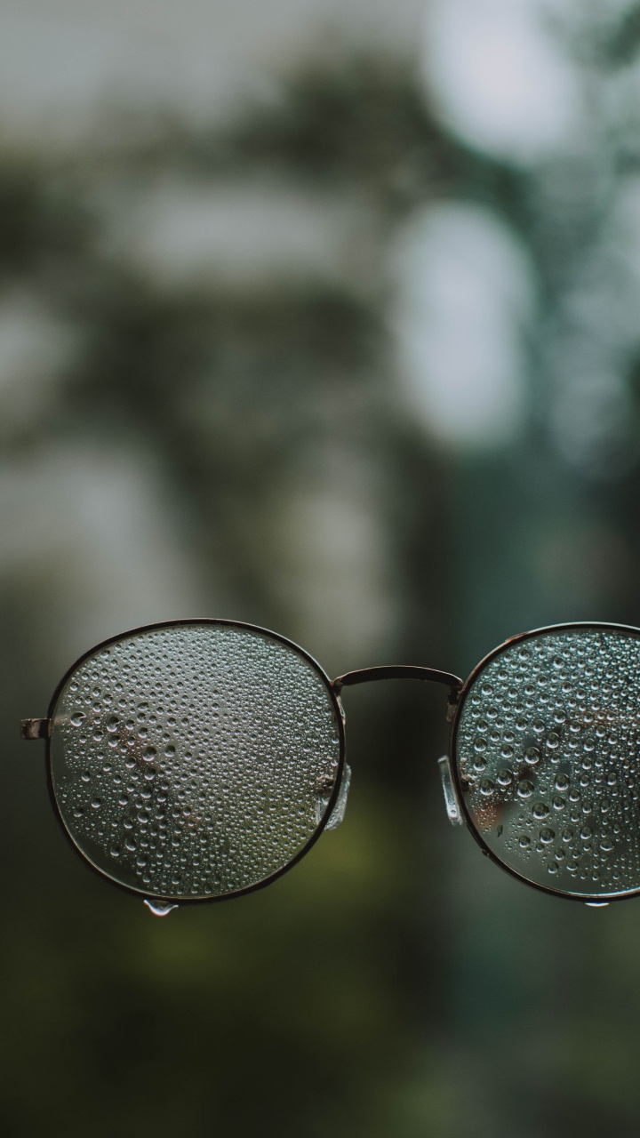 Silver Framed Aviator Style Sunglasses. Wallpaper in 720x1280 Resolution