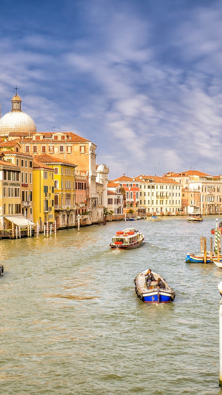 People Riding on Boat on River Near Buildings During Daytime. Wallpaper in 720x1280 Resolution
