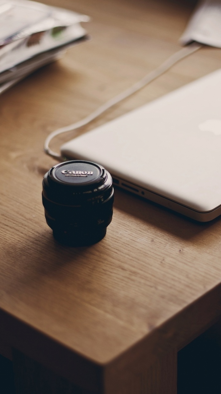 Black Camera Lens on Brown Wooden Table. Wallpaper in 720x1280 Resolution