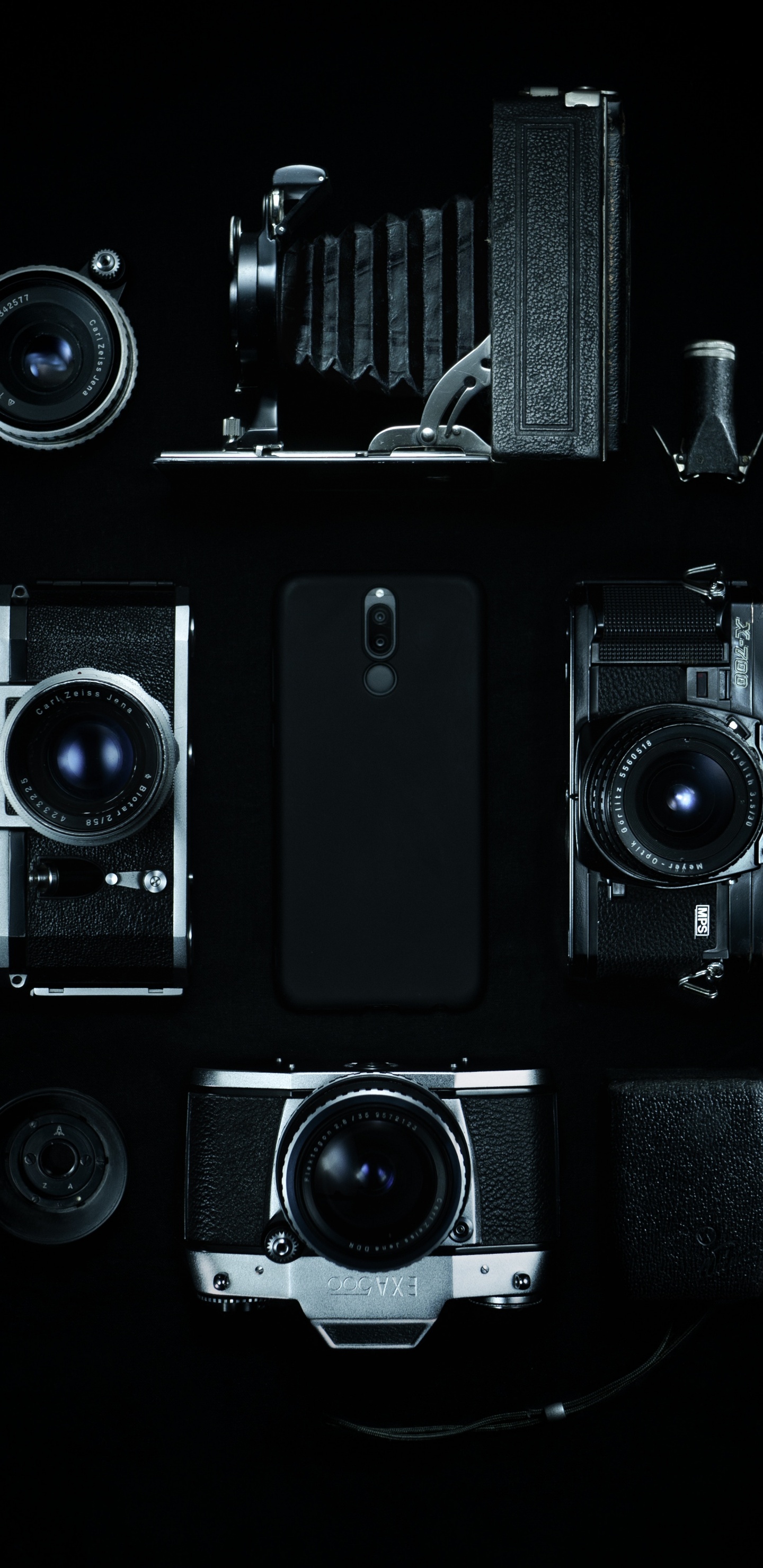 Schwarzes Und Silbernes Kameralos. Wallpaper in 1440x2960 Resolution
