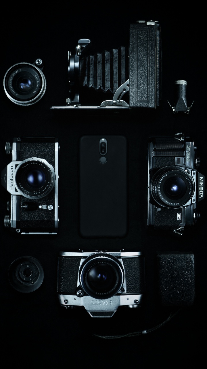 Lot D'appareils Photo Noir et Argent. Wallpaper in 720x1280 Resolution