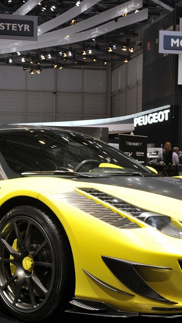 Yellow Lamborghini Aventador Parked Inside Building. Wallpaper in 720x1280 Resolution