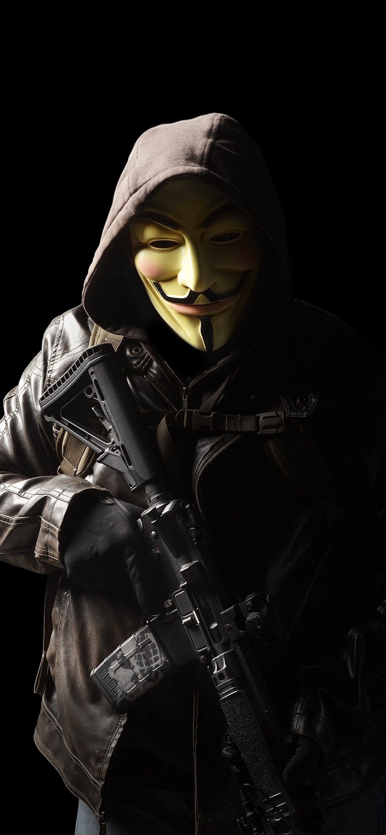 Person in Black Hoodie Holding Black Rifle. Wallpaper in 1242x2688 Resolution