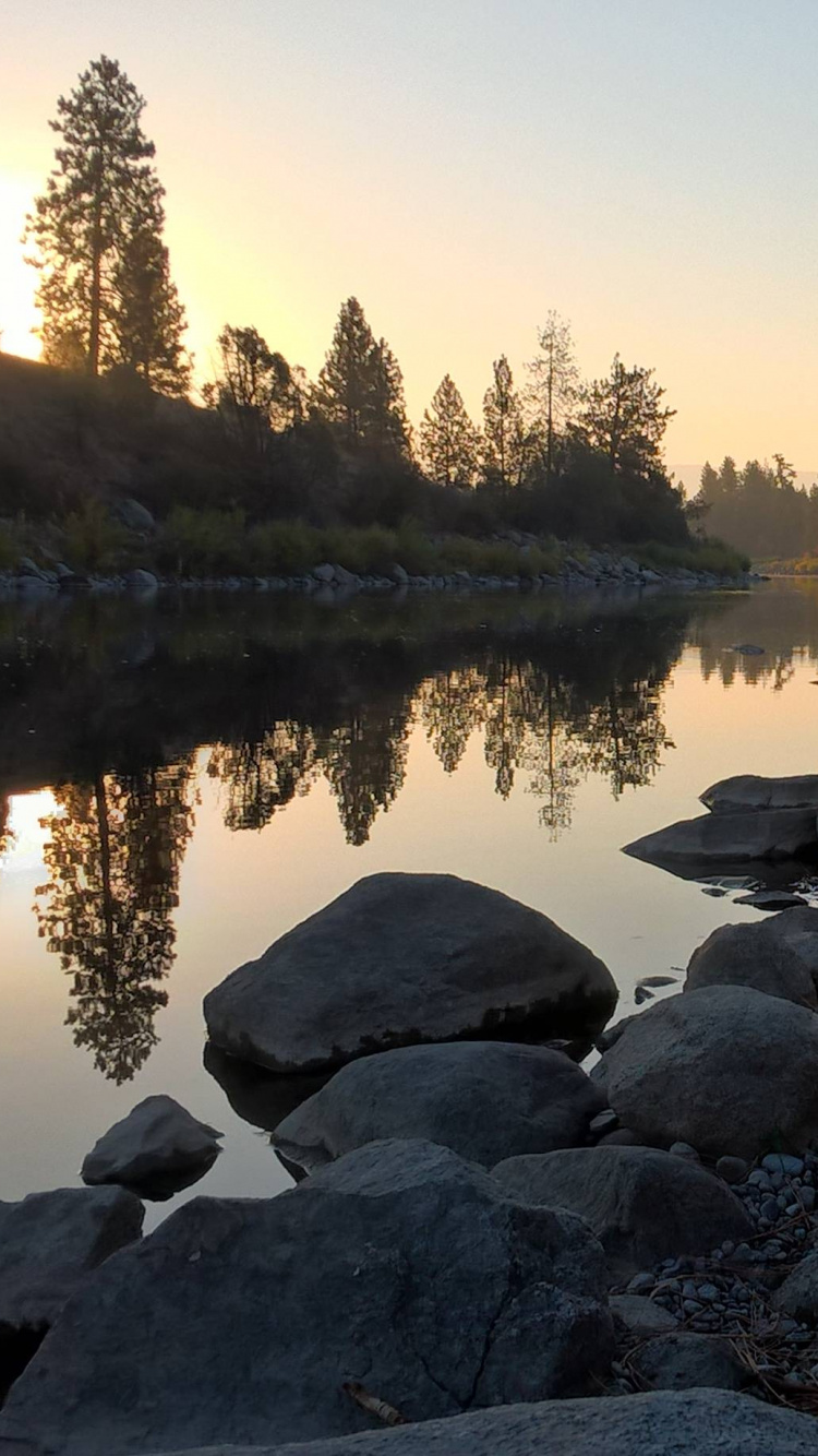 Gray Rocks on Lake Shore During Daytime. Wallpaper in 750x1334 Resolution