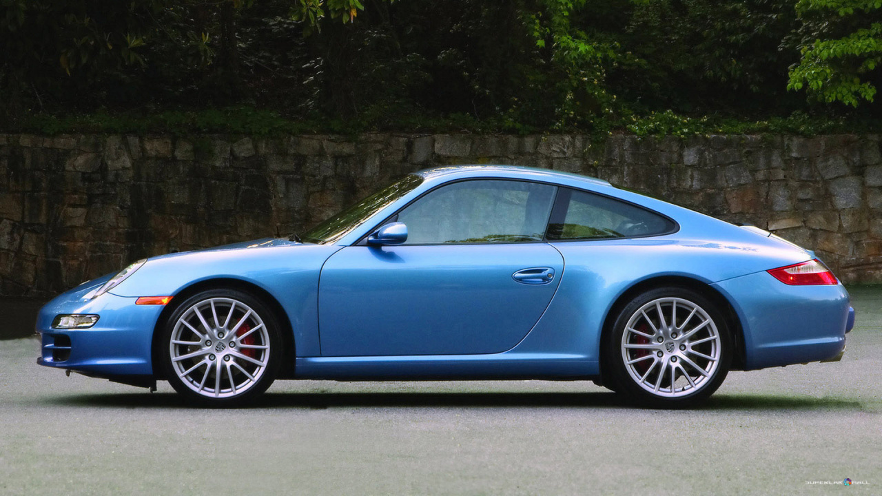 Blue Car Parked Near Green Trees During Daytime. Wallpaper in 1280x720 Resolution