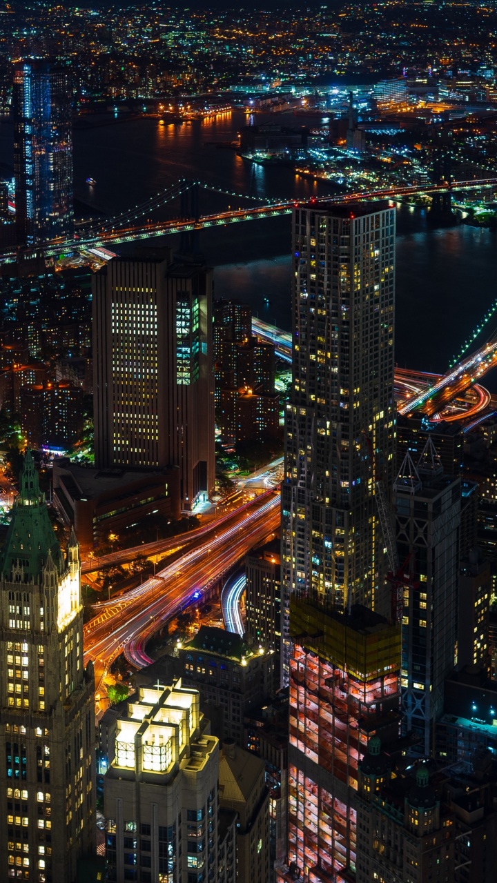 Vue Aérienne Des Bâtiments de la Ville Pendant la Nuit. Wallpaper in 720x1280 Resolution