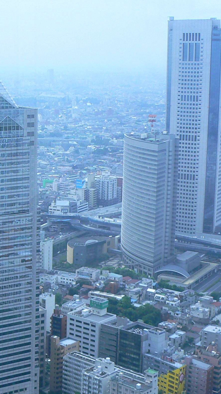 Luftaufnahme Von Stadtgebäuden Tagsüber. Wallpaper in 750x1334 Resolution