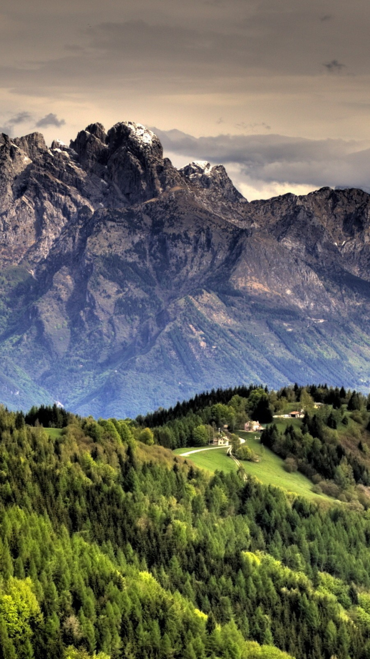 Green and Brown Mountains Under White Clouds During Daytime. Wallpaper in 750x1334 Resolution