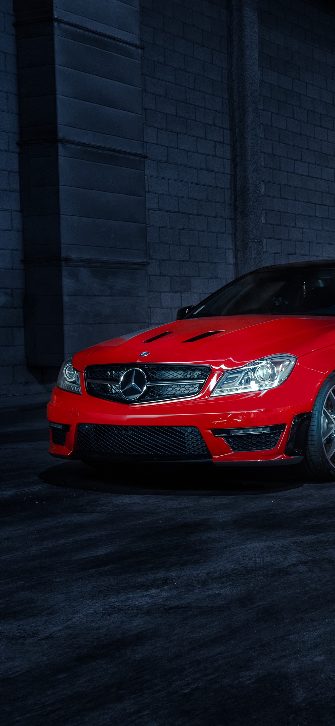 Red Bmw m 3 Coupe Parked on Gray Concrete Road. Wallpaper in 1125x2436 Resolution