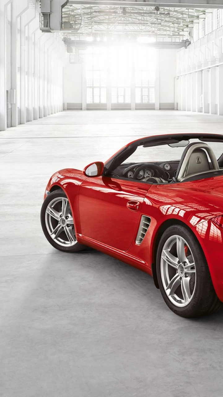 Red Ferrari 458 Italia Parked Near White Building. Wallpaper in 720x1280 Resolution