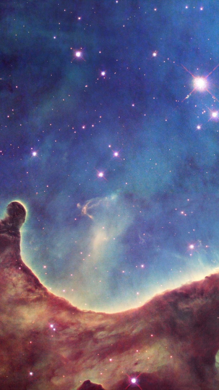 Abbildung Der Braunen Und Weißen Galaxie. Wallpaper in 720x1280 Resolution