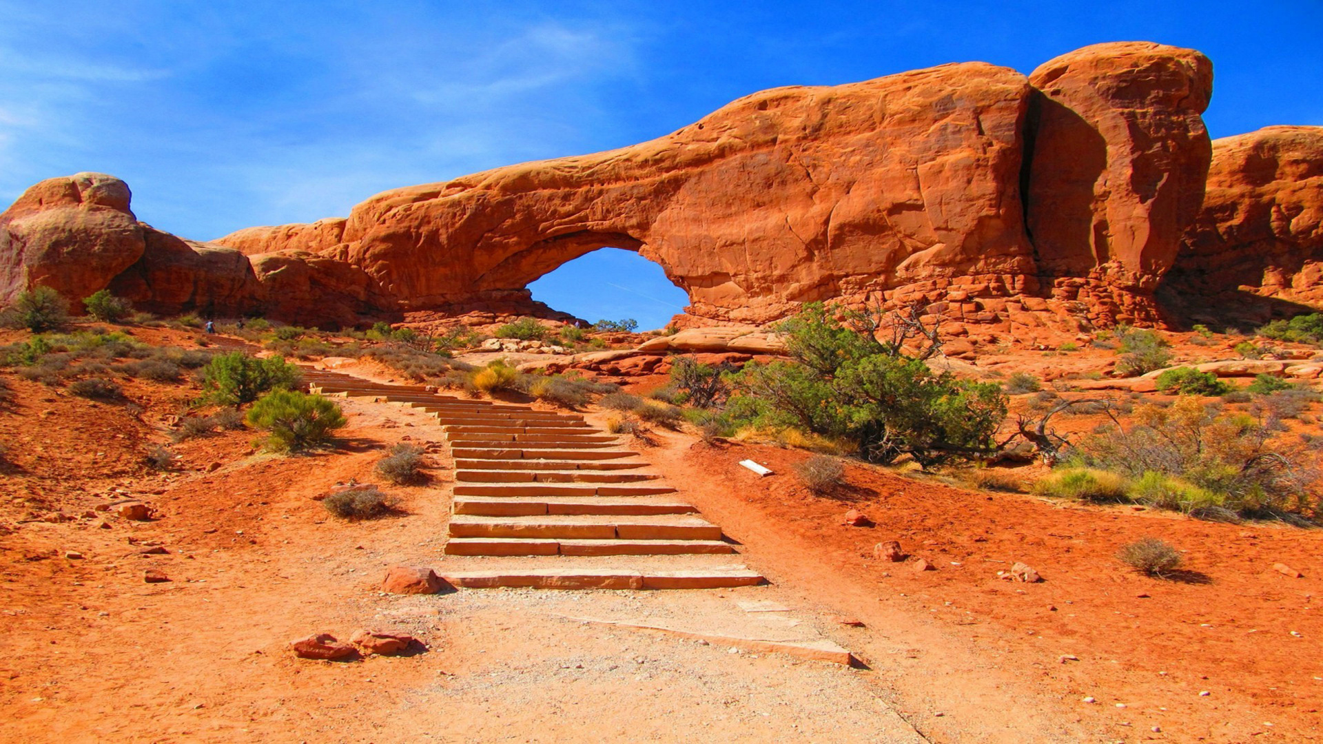 Brown Wooden Stairs Near Brown Rock Formation Under Blue Sky During Daytime. Wallpaper in 1920x1080 Resolution