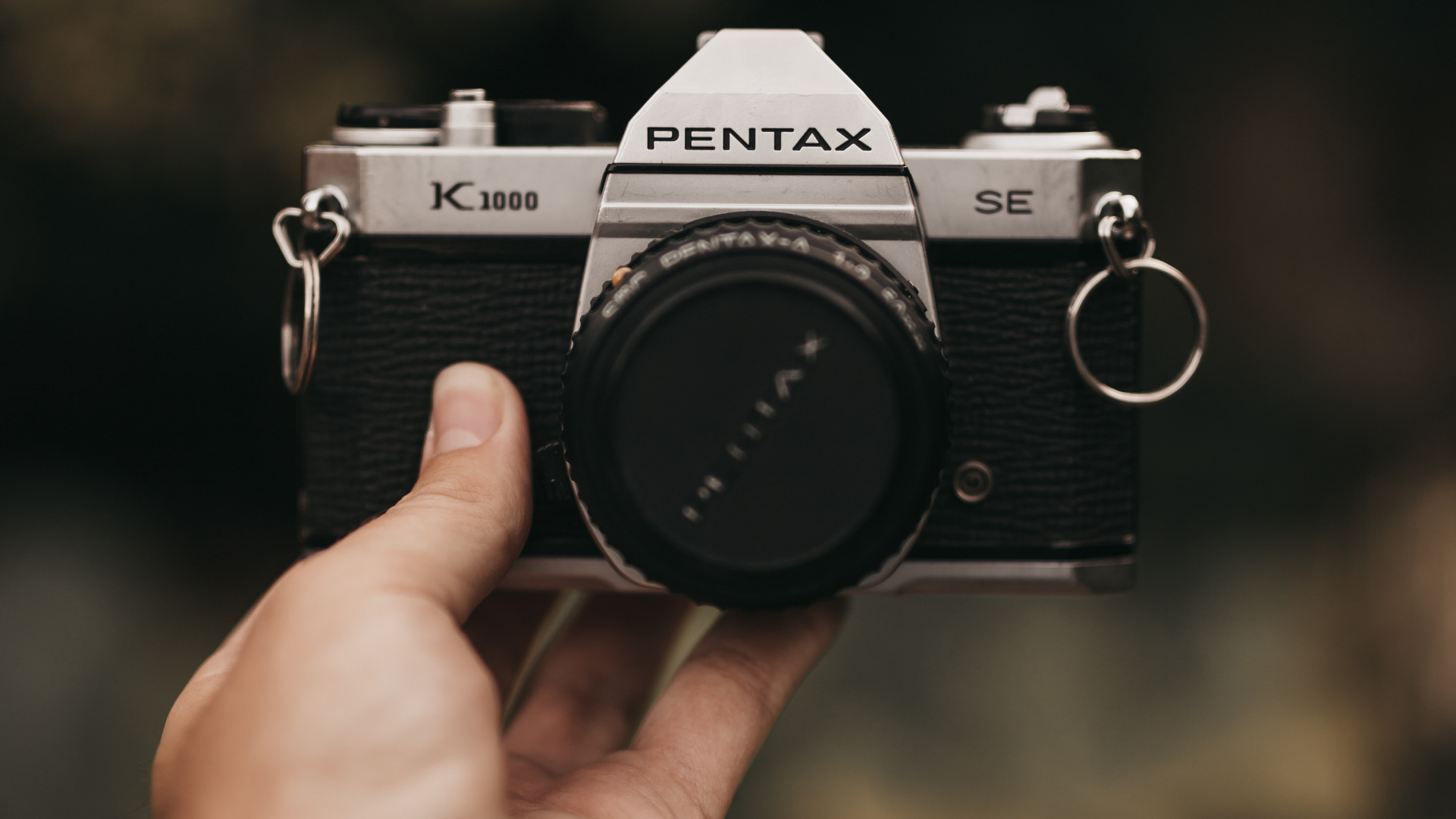 Person Holding Black and Silver Nikon Dslr Camera. Wallpaper in 1920x1080 Resolution