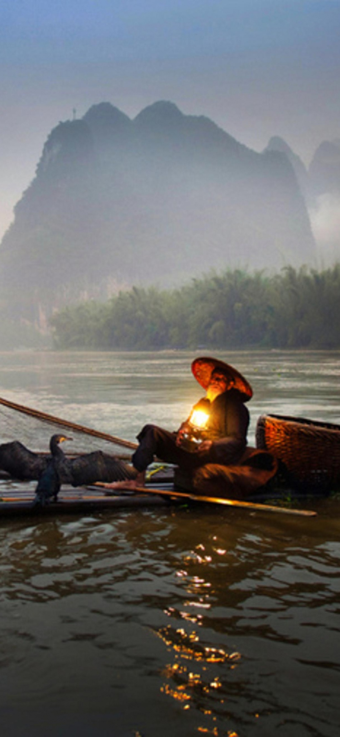2 Men Riding on Boat on Lake During Daytime. Wallpaper in 1125x2436 Resolution