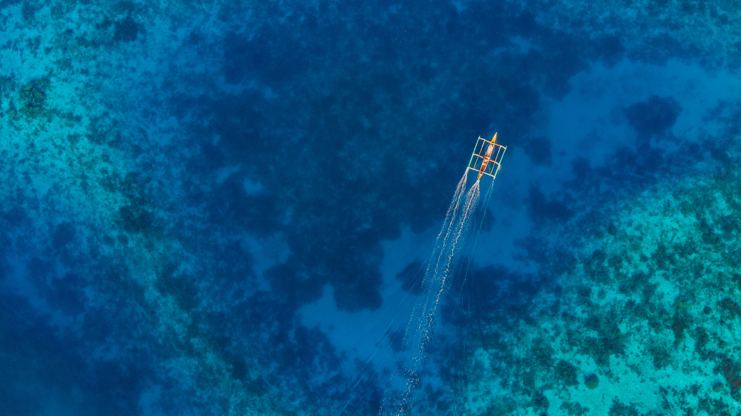 Aerial View of White Boat on Body of Water During Daytime. Wallpaper in 2560x1440 Resolution