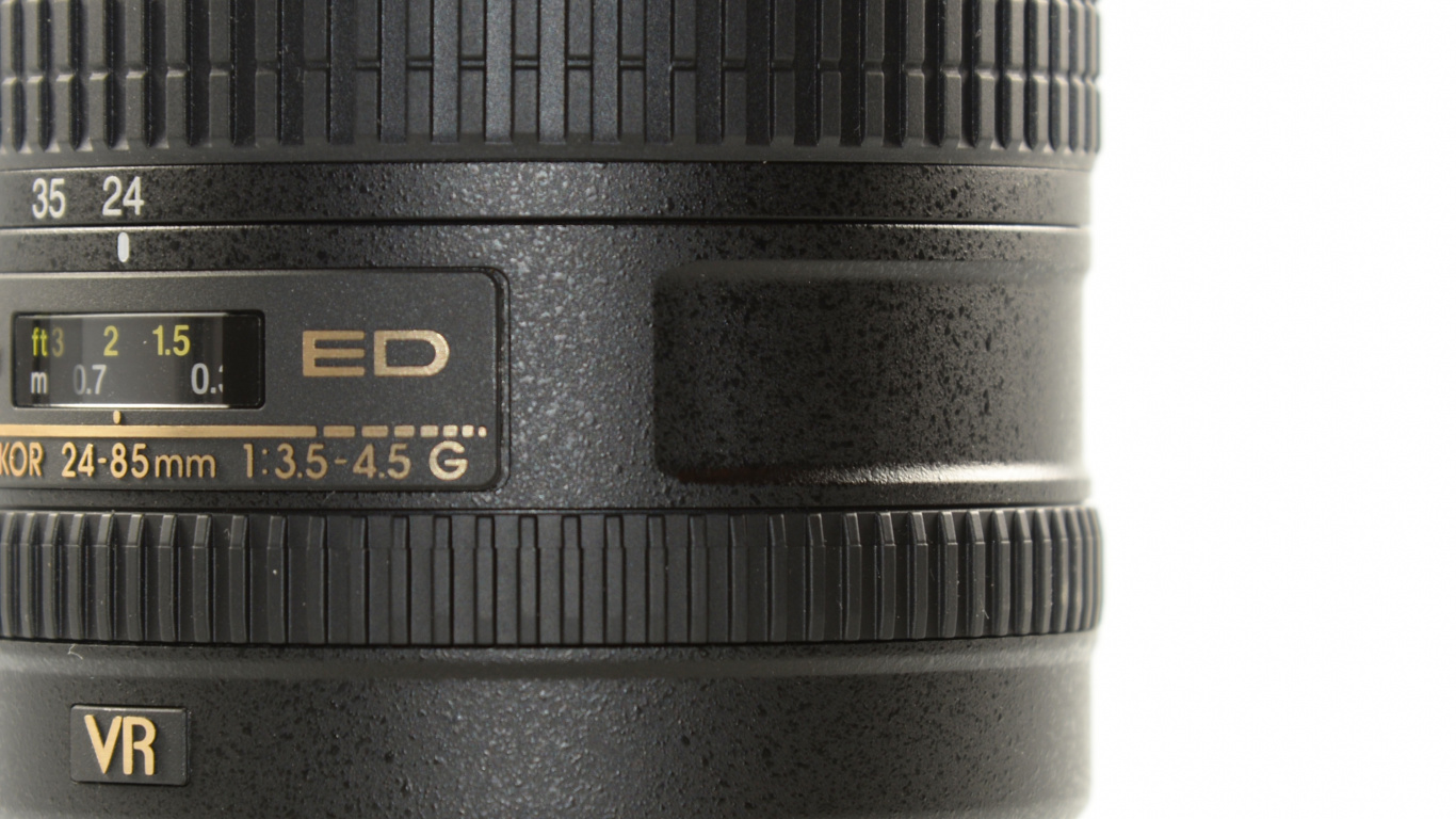Black Nikon Dslr Camera Lens. Wallpaper in 1366x768 Resolution