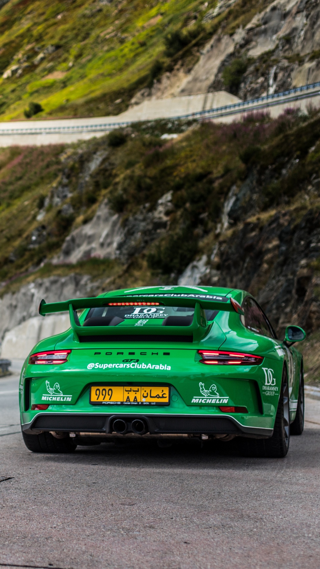 Green Porsche 911 on Road During Daytime. Wallpaper in 1080x1920 Resolution