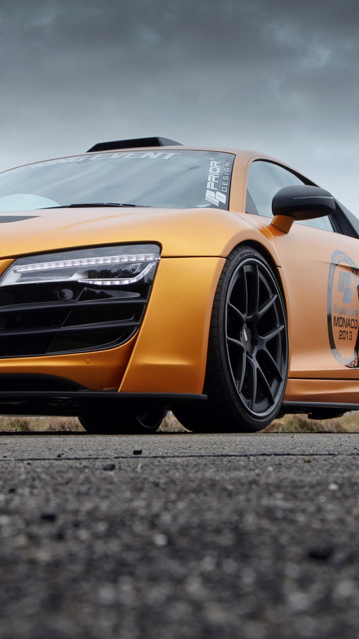 Orange Audi r 8 on Road During Daytime. Wallpaper in 720x1280 Resolution