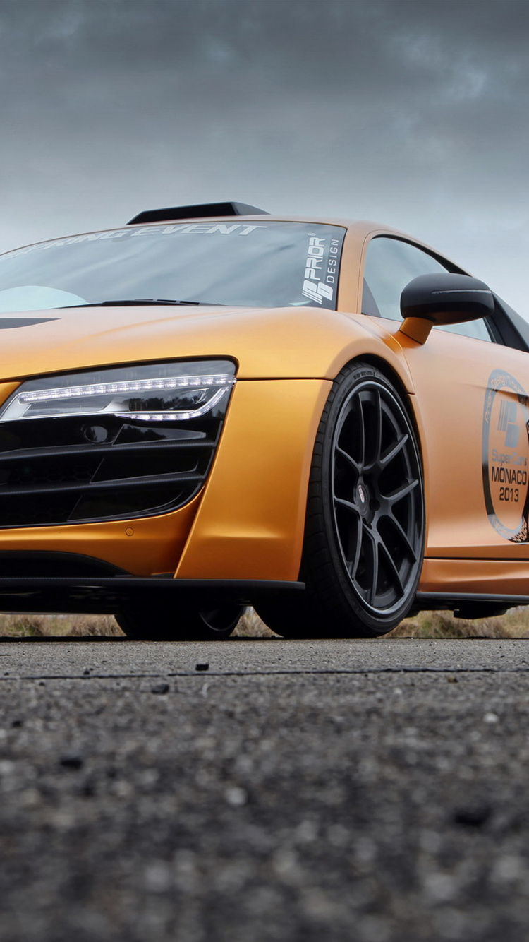 Orange Audi r 8 Tagsüber Unterwegs. Wallpaper in 750x1334 Resolution