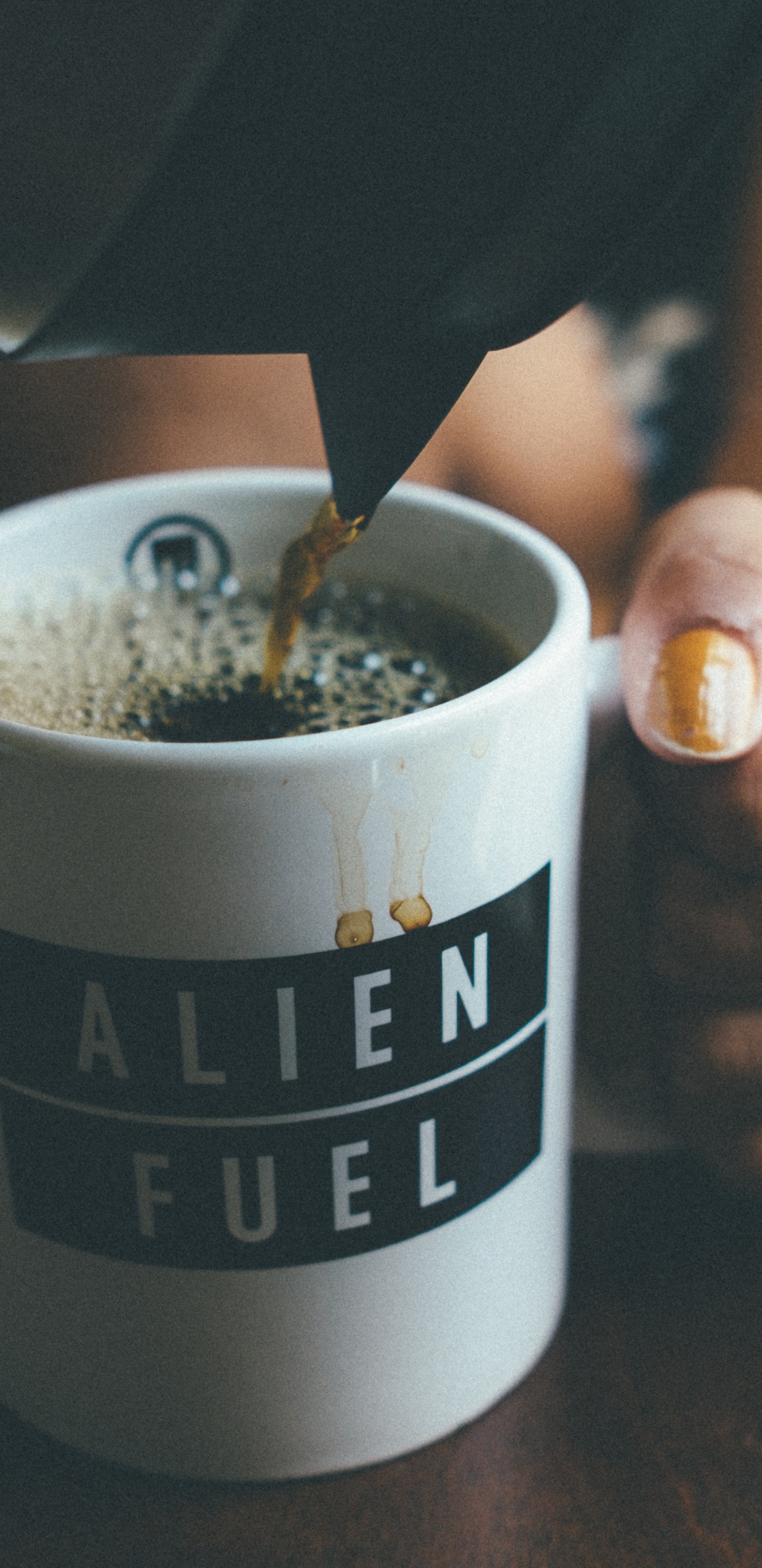 Person Holding White and Black Ceramic Mug With Coffee. Wallpaper in 1440x2960 Resolution