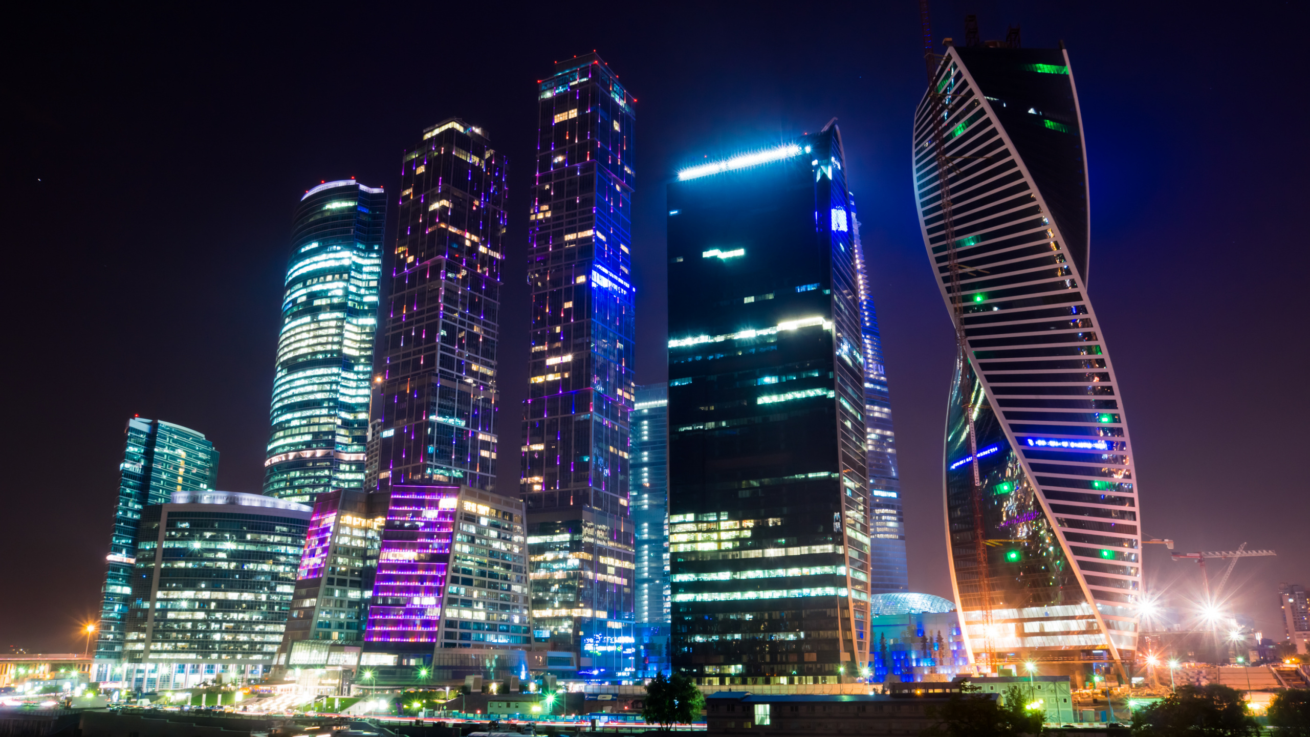 City Buildings With Lights During Night Time. Wallpaper in 2560x1440 Resolution