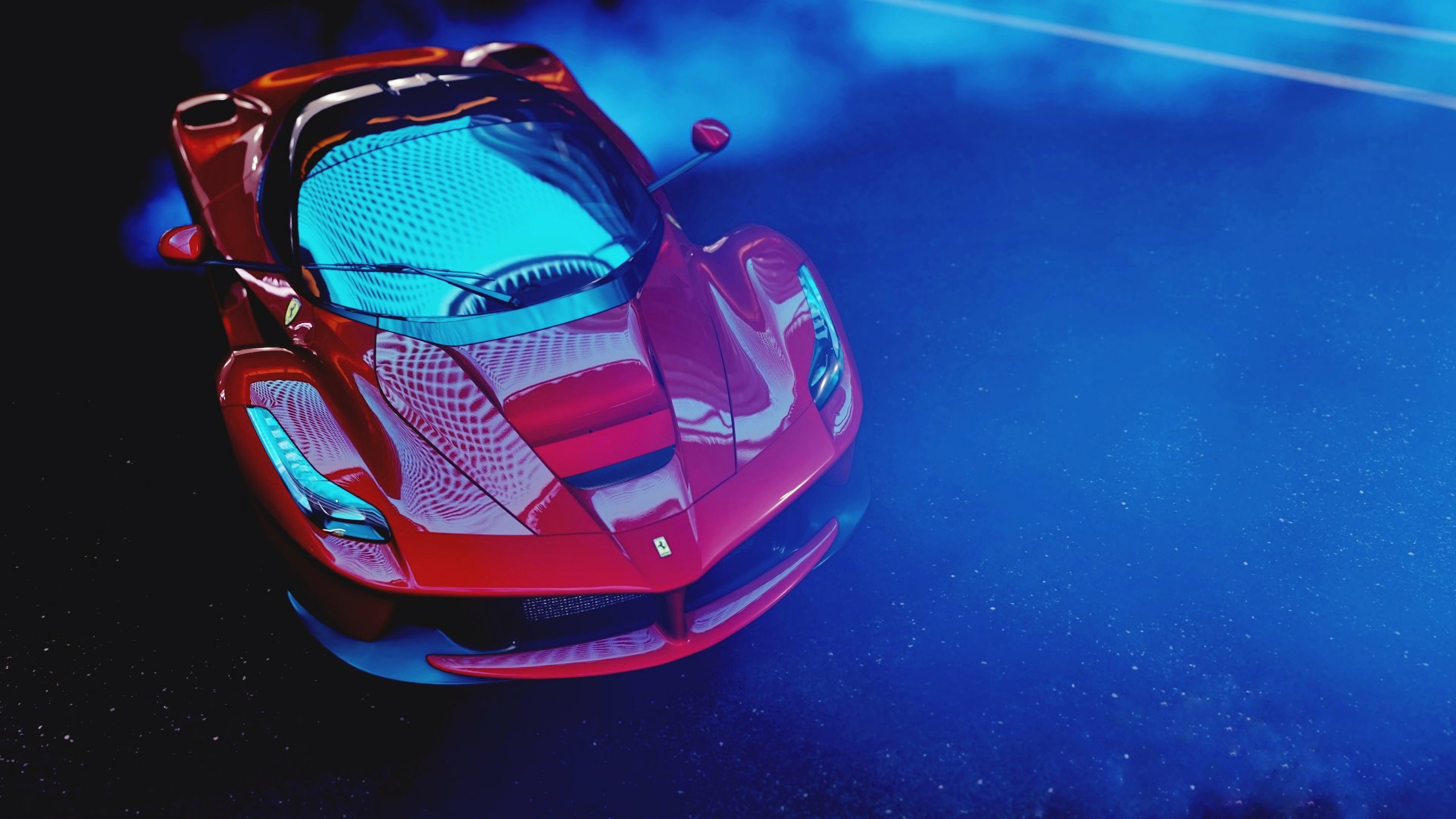 Red Ferrari Car in a Dark Room. Wallpaper in 2560x1440 Resolution