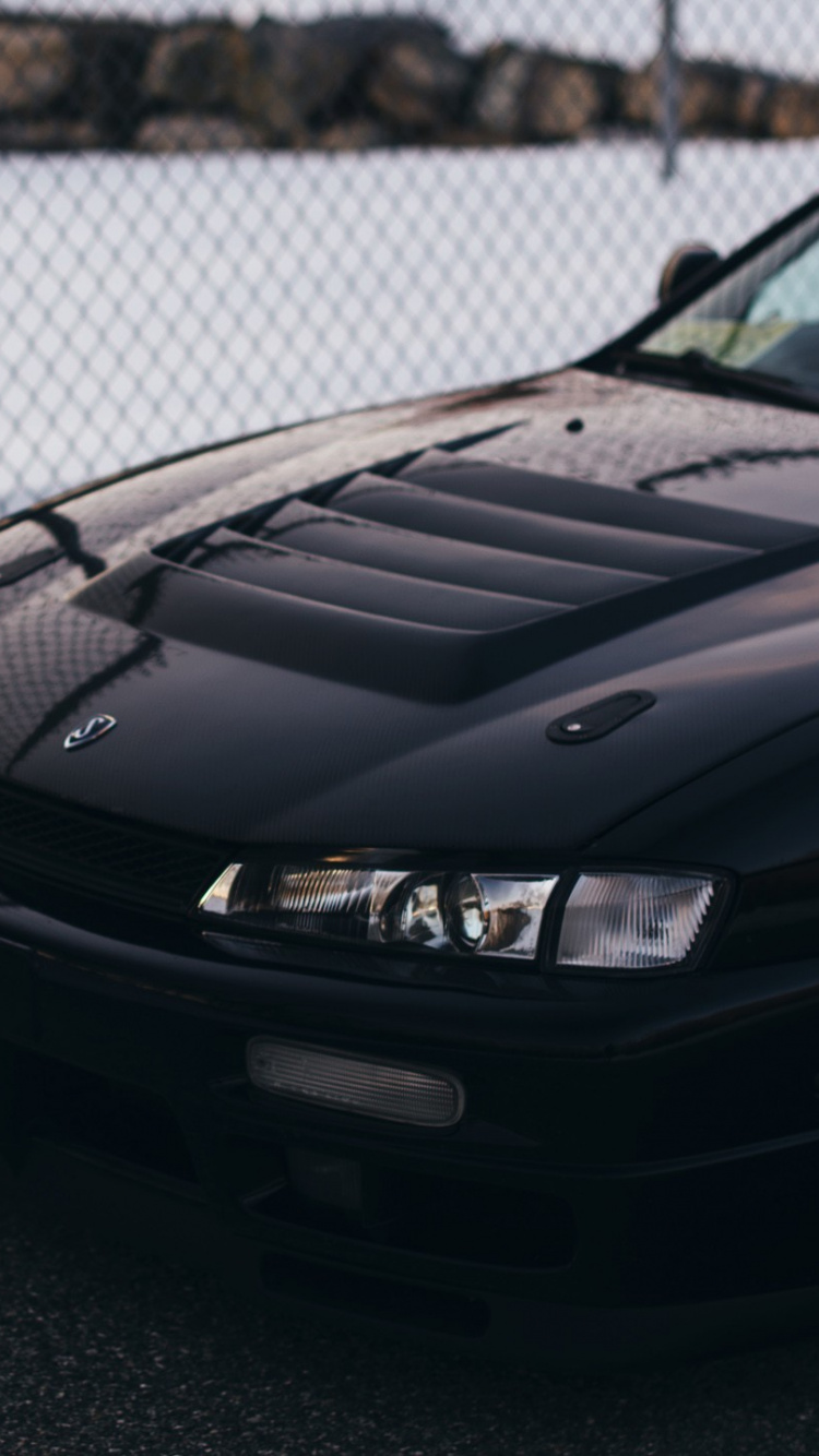 BMW M 3 Coupe Negro Estacionado Cerca de la Valla de Metal Blanco Durante el Día. Wallpaper in 750x1334 Resolution