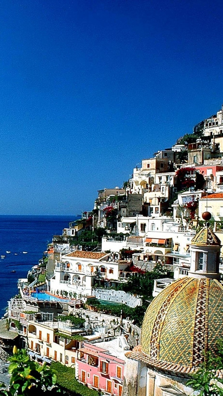 Aerial View of City Buildings Near Sea During Daytime. Wallpaper in 720x1280 Resolution