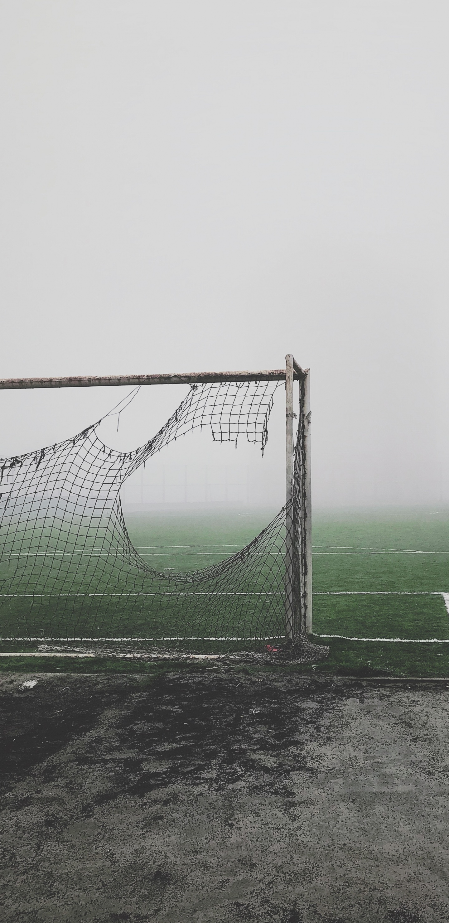 White Soccer Goal Net on Green Grass Field. Wallpaper in 1440x2960 Resolution