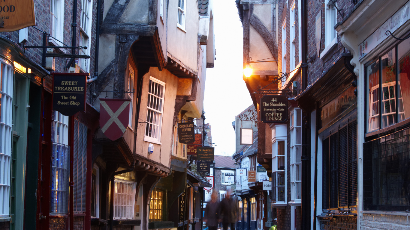 People Walking on Street Between Buildings During Daytime. Wallpaper in 1366x768 Resolution