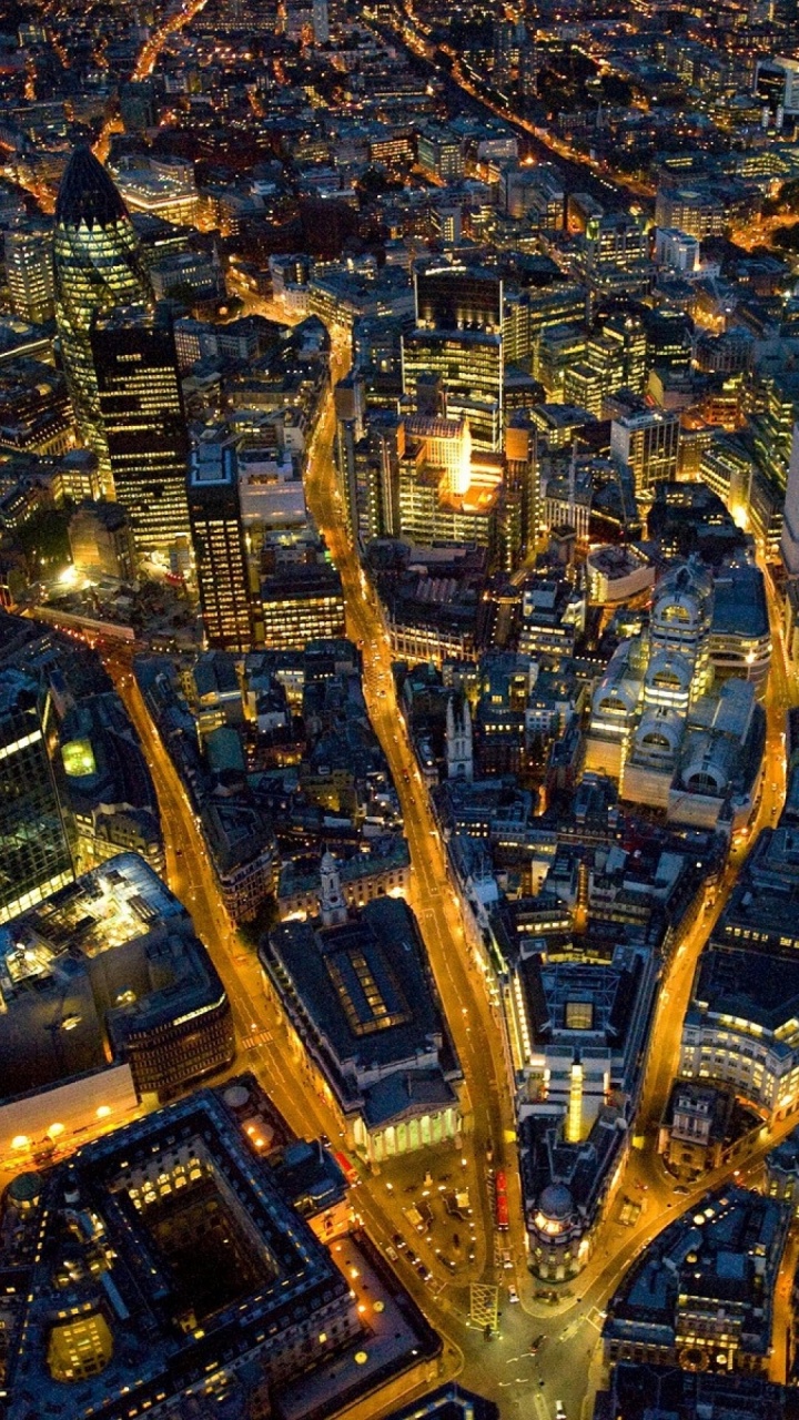 Aerial View of City Buildings During Night Time. Wallpaper in 720x1280 Resolution