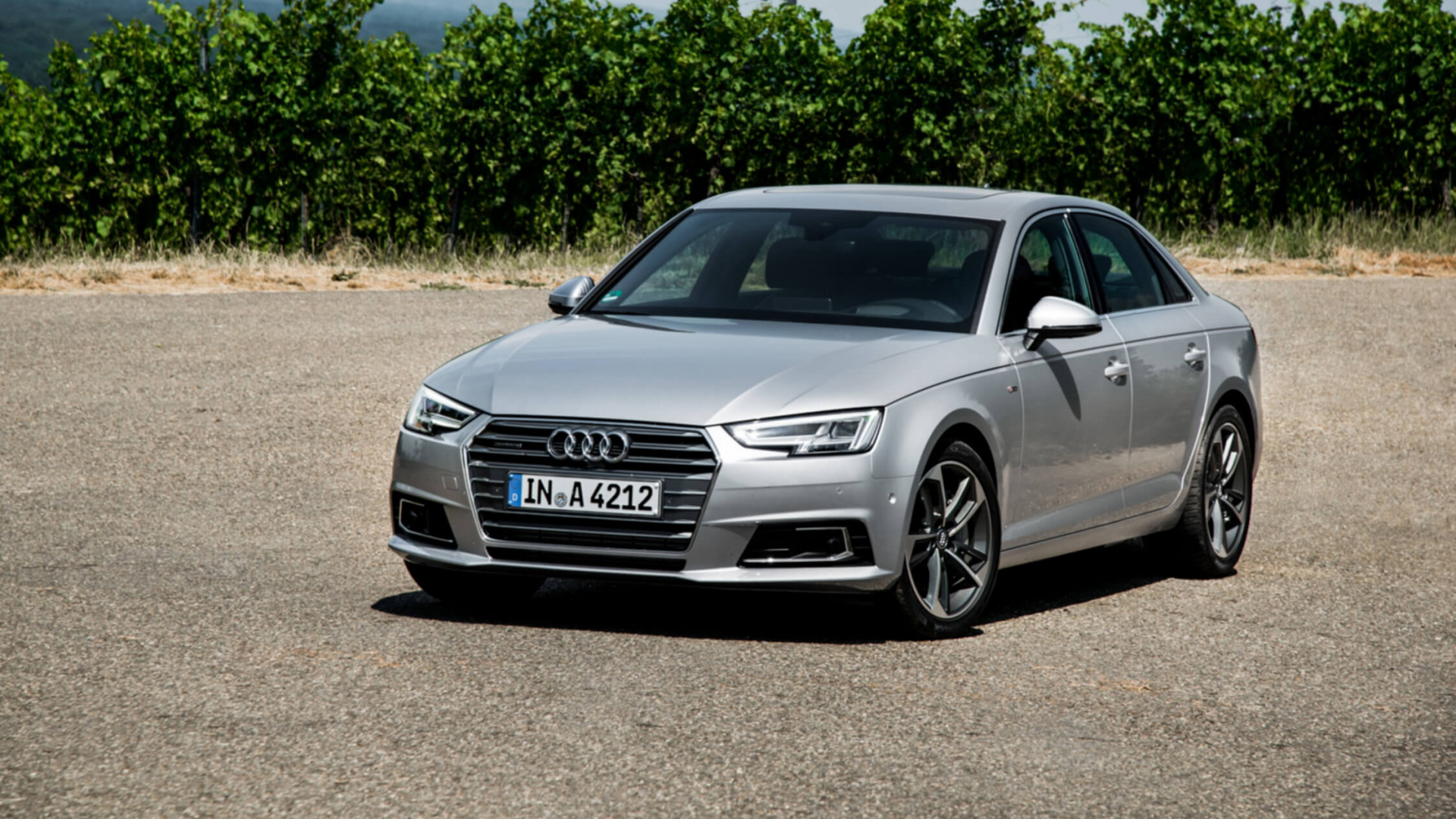 Black Audi a 4 Sedan Parked on Gray Asphalt Road During Daytime. Wallpaper in 1920x1080 Resolution